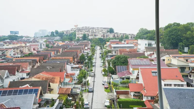 Terraced houses along a taman street in Kuala Lumpur